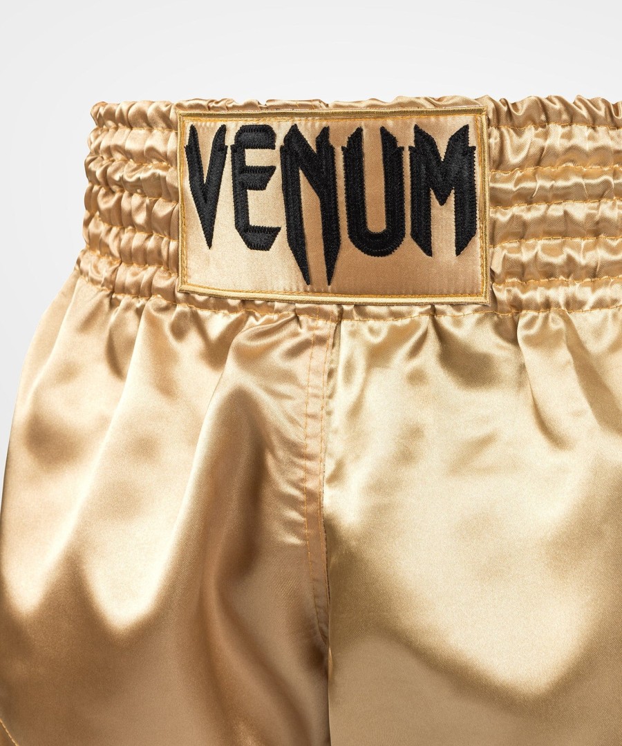 spodenki venum classic muay thai – złotoczarne