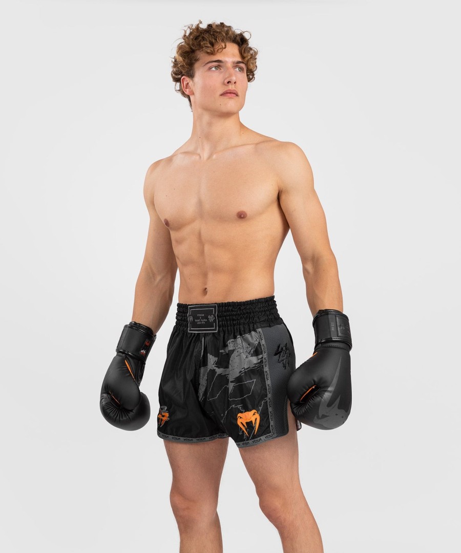 spodenki do muay thai venum s47 - czarno-pomarańczowe