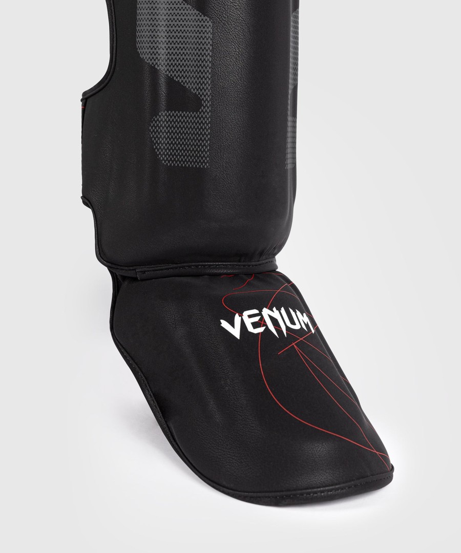ochraniacze piszczeli venum tactical xt – czarneognistoczerwone